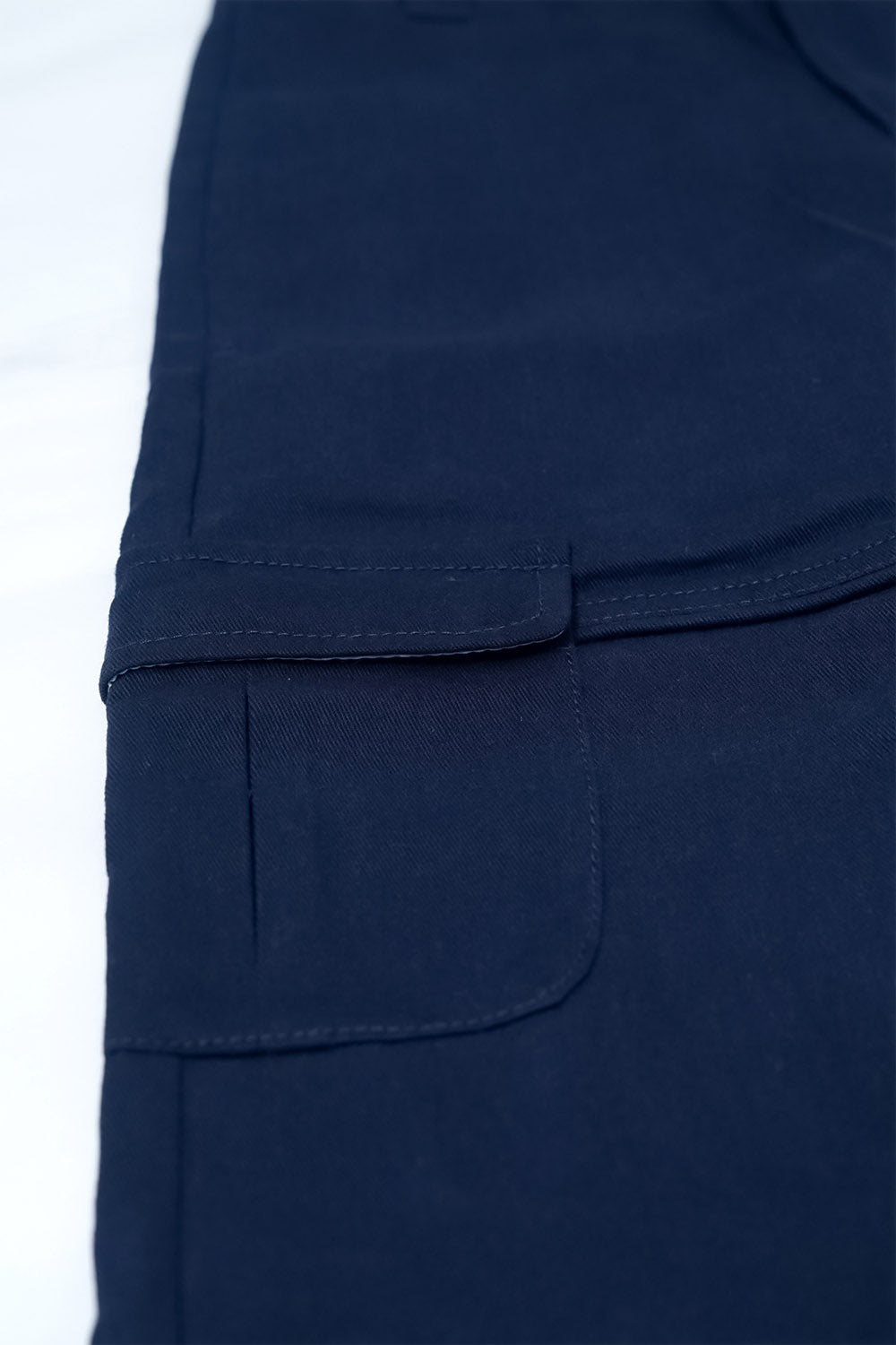 Luxe & Hardy Ash Blue Co-ord Set – close-up of navy blue wide leg cargo pants pocket and waistband detail, boys ethnic casual co ord set bottom, premium fabric and multi pocket construction
