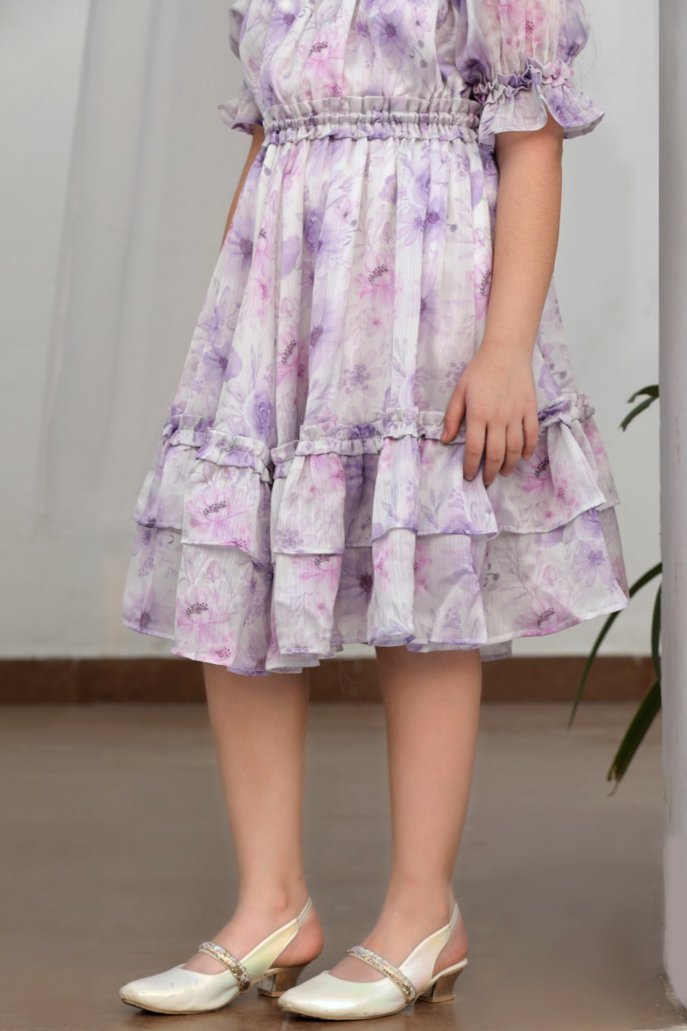 Full-length front view of lavender floral dress, shoes visible