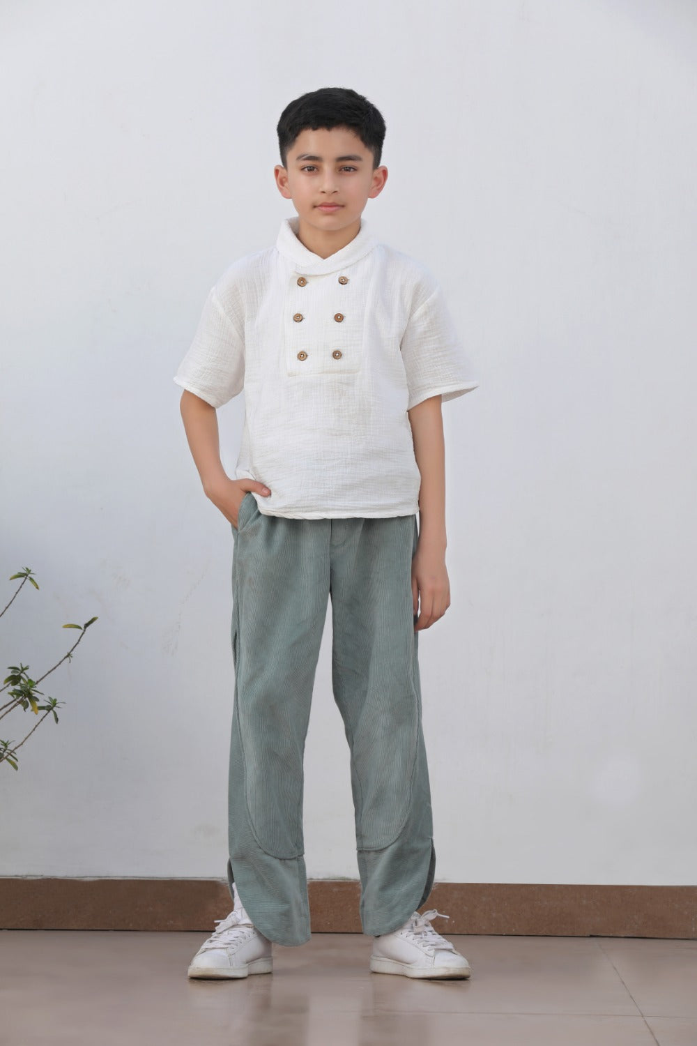 Luxe & Hardy Milo Textured Pant – full length front view of sage green textured wide leg relaxed pants, boys ethnic casual bottom wear, styled with white shirt and white sneakers