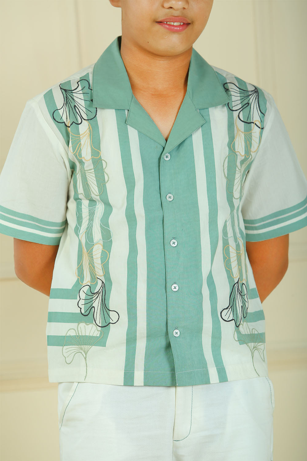 Luxe & Hardy Tundra Trek Shirt – full length front view of teal green white striped short sleeve shirt with white pants, boys casual party wear shirt, festive outfit for kids