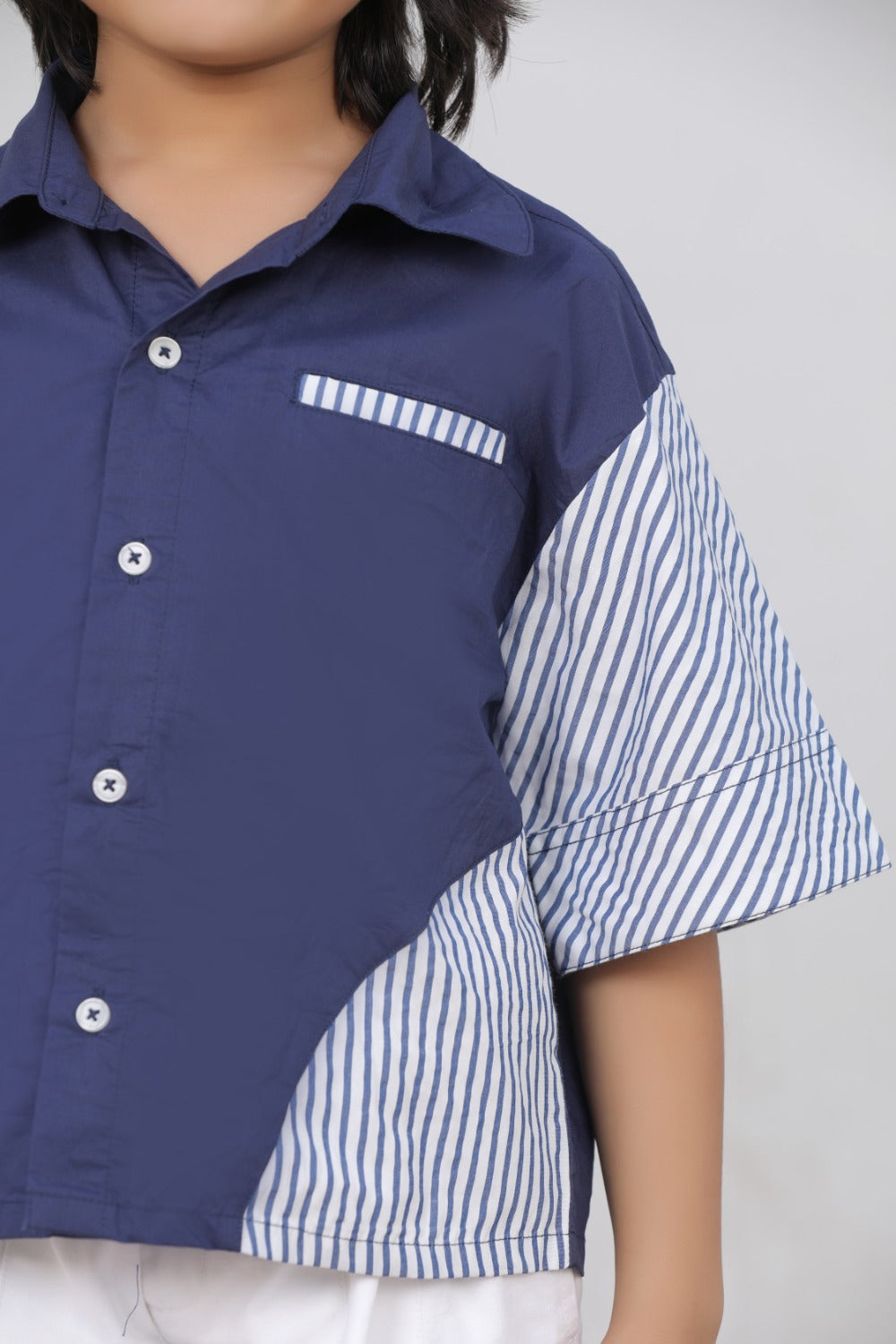 Luxe & Hardy Theo Blue Striped Shirt – close-up front view of navy blue white stripe contrast panel boys shirt with embroidered chest logo detail, kids ethnic casual party wear shirt, premium contrast panel construction