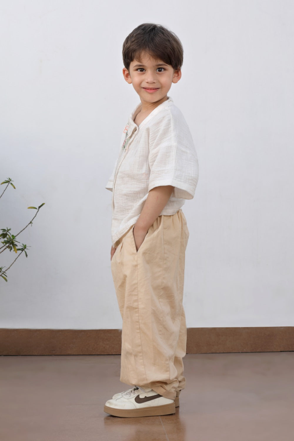 Luxe & Hardy Breathing Beige Pant – back view full length of beige wide leg palazzo pants for toddler boys, kids ethnic party wear bottom, comfortable linen festive pants