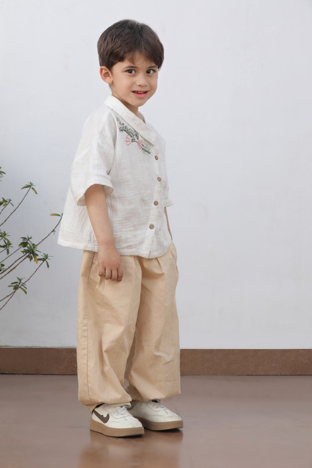 Luxe & Hardy Breathing Beige Pant – side profile full length view of beige linen wide leg pants for boys, kids ethnic casual bottom wear, toddler festive party wear outfit