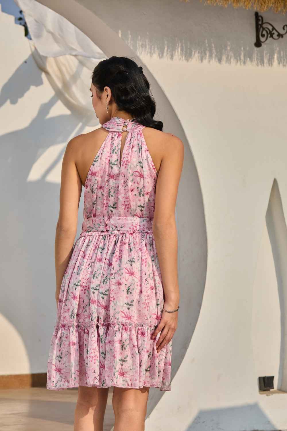 Luxe & Hardy Iris Halter Dress in Lavender – full length standing pose showing lavender pink floral print, halter neckline and tiered ruffle mini skirt