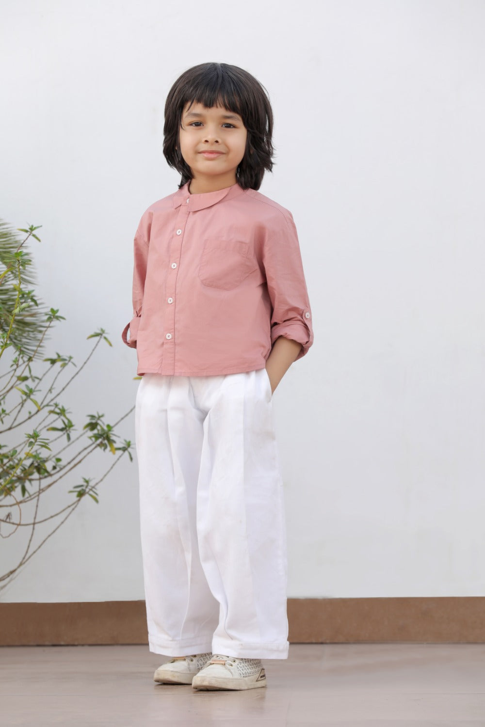 Luxe & Hardy Henry Relaxed Pants – full length standing pose of white wide leg relaxed linen pants with pink long sleeve shirt, toddler boys ethnic casual bottom wear, indoor white wall setting