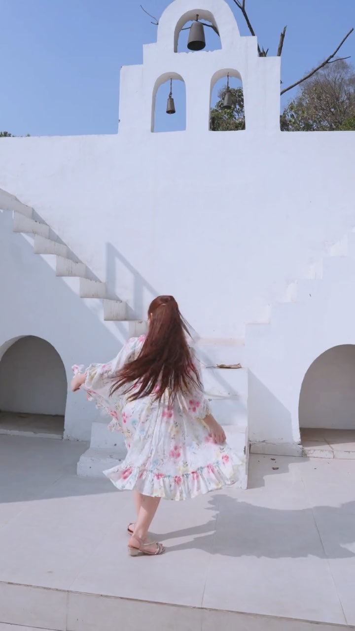 Girl in white floral dress in bright outdoor setting — video preview