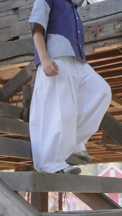 Luxe & Hardy Theo White Relaxed Pants – video of white ultra wide leg relaxed dhoti style boys pants in motion, play to see full kids ethnic festive bottom wear styling