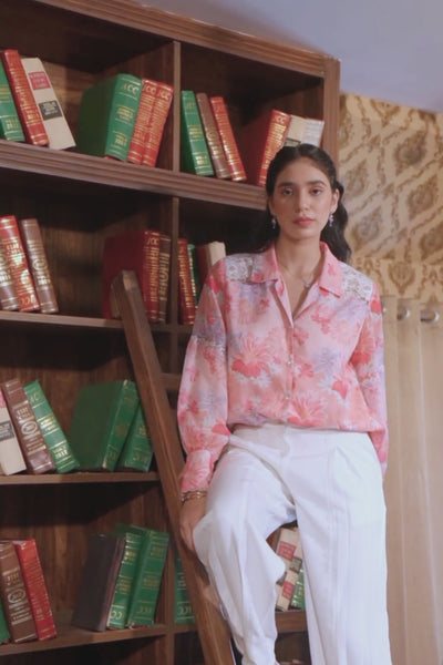 Luxe & Hardy Celeste Lace Co-ord Set Pink – video of pink floral lace oversized shirt and white trouser co ord set for women in motion, play to see full styling